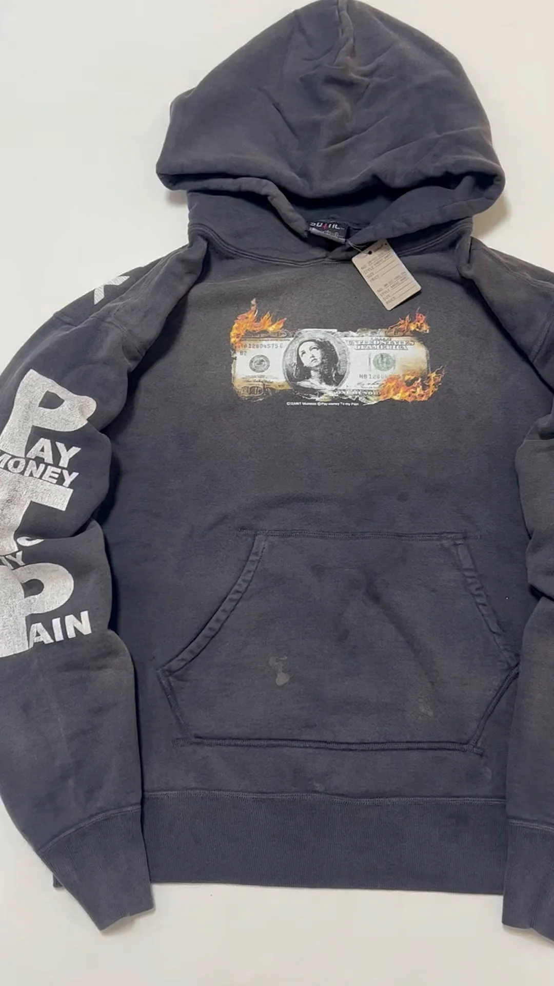 SAINT Mxxxxxx × PAY MONEY TO MY PAIN PTP_HOODIE/BRAND MONEY/BLK Co-branded PTP Virgin Mary dollar hoodie Washed black S-XL Assute dyeing The whole piece is sprayed with horse fade Mold customization joint main mark/washed mark Factory four-needle and six-thread workmanship No bone seams More comfortable to wear Repeated modification of proofing Authentic grade crack printing VINTAGE value is full